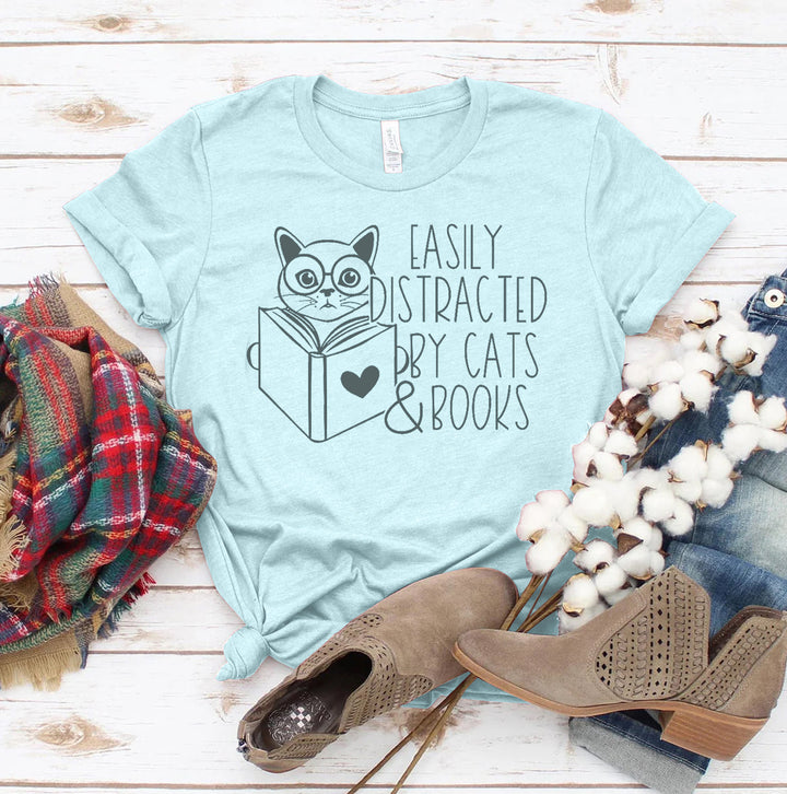 Heather Ice Blue t-shirt with cat and book graphic and text &