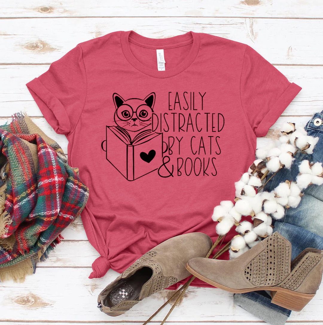 Heather Raspberry t-shirt with a cat and book graphic and text &