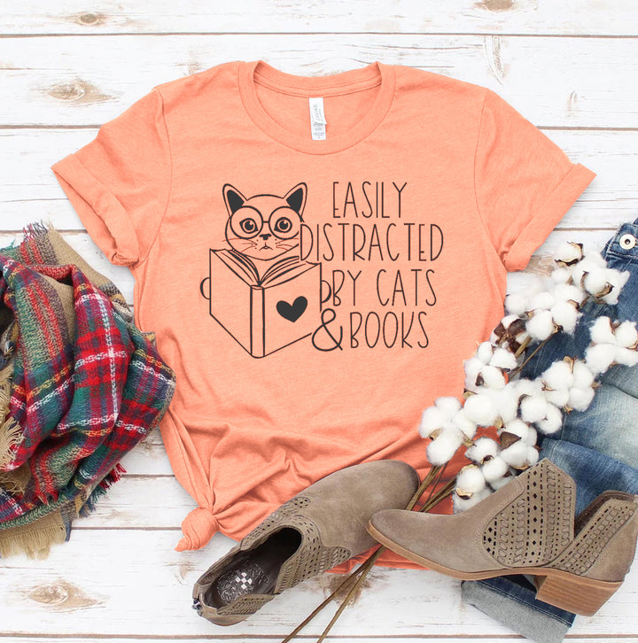 Heather Sunset t-shirt with cat and book graphic and text &