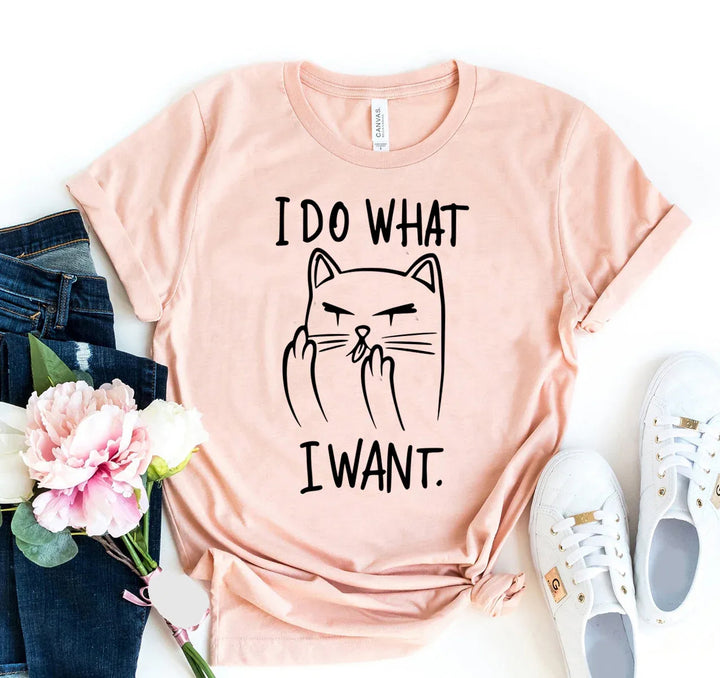 Peach t-shirt with a cat graphic and &