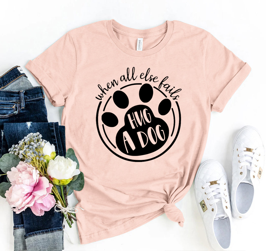 Peach t-shirt with paw print design and &