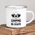 Camping Mug featuring a design with trees and text 'Camping is IN-TENTS' on a wooden table.